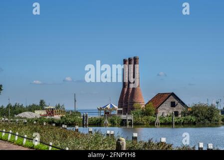 Enkhuizen, the Netherlands - September 2020. The Zuiderzeemuseum; an open air museum at the shore of the IJsselmeer with traditional Dutch fishermen cottages and flat bottomed fishing boats. High quality photo. Stock Photo