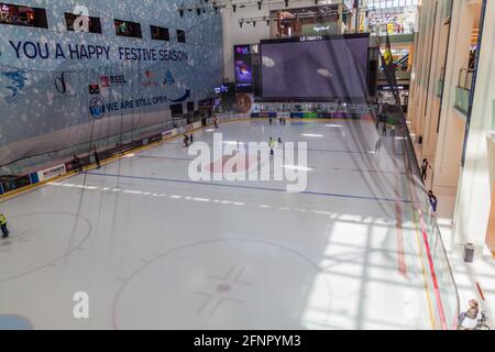 DUBAI, UAE - MARCH 12, 2017: Ice ring in the Dubai Mall, one of the largest malls in the world. Stock Photo