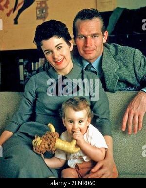 CHARLTON HESTON (1923-2008) American film actor with his wife Lydia Clarke and their son Fraser about 1957 Stock Photo