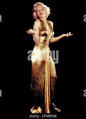 MARILYN MONROE (1926-1962)  American film actress in the gold lamé dress designed by William Travilla for the film Gentlemen Prefer Blondes in 1953 Stock Photo