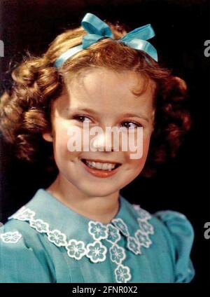 SHIRLEY TEMPLE (1928-2014) American film actress, later diplomat, in 1938 Stock Photo