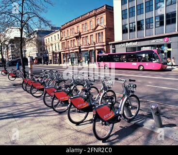 City bikes and bus. Belfast city centre Medium format filmstreet photography Stock Photo