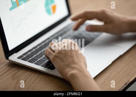 Closeup of marketing specialist working with infographic on pc screen Stock Photo