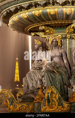 Fontaine des Fleuves - Fountain of Rivers at Place de la Concorde with the Eiffel Tower beyond, Paris, France Stock Photo