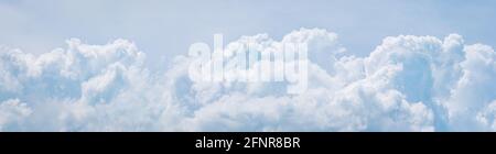 Light blue cumulus clouds texture, wide summer sky background Stock Photo