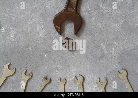 Wrench nuts and bolts on stone background. Father and Sons concept. Fathers Day concept. Flat lay. Stock Photo