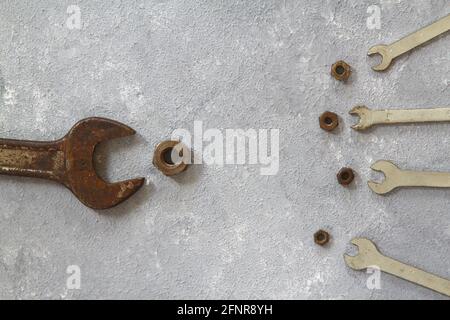 Wrench nuts on stone background. Father and Sons concept. Fathers Day concept. Flat lay. Stock Photo