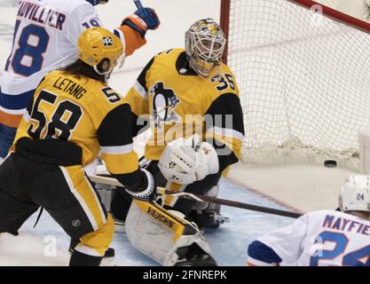 Pittsburgh Penguins goaltender Tristan Jarry (35) reacts as New York Islanders center Josh Bailey  scores in the second period of first round of the NHL Stanley Cup playoff series at PPG Paints Arena in Pittsburgh on Tuesday, May 18, 2021.    Photo by Archie Carpenter/UPI Stock Photo