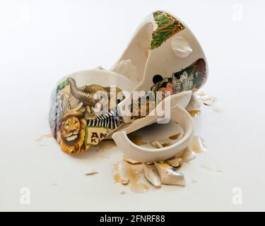 Broken coffee cup (broken coffee mug) - USA Stock Photo