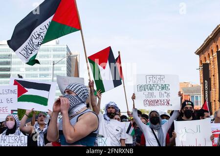 Columbus, United States. 18th May, 2021. Demonstrators chant slogans while holding flags during the demonstration. Demonstrators gathered at the Ohio Statehouse to protest against Israel's occupation of Palestine. Credit: SOPA Images Limited/Alamy Live News Stock Photo