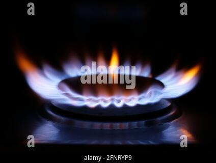 File photo dated 28/2/2015 of a lit ring on a gas hob at a home in north London. Britain's rate of inflation more than doubled in April as energy costs soared and clothing retailers hiked their prices, according to official figures. The Office for National Statistics (ONS) said Consumer Price Index (CPI) inflation jumped from 0.7% in March to 1.5% in April, the highest level since March last year. Issue date: Wednesday May 19, 2021. Stock Photo