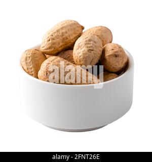 Isolated bowl of peanuts in shell on white Stock Photo