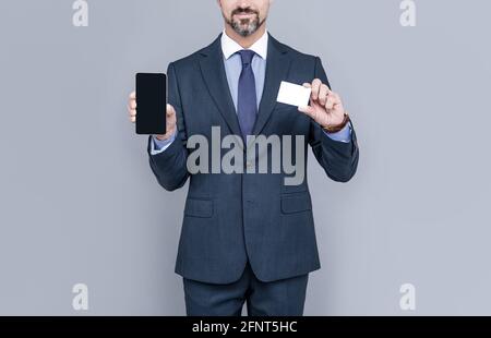 cyber monday. manager showing smartphone. man pay in online banking. online money. Stock Photo