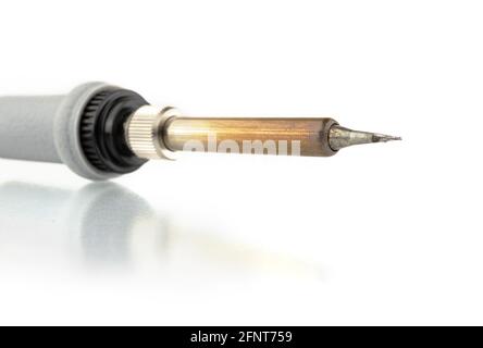 Soldering iron equipment tool isolate on a white background with reflection, close-up Stock Photo