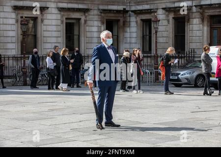 Queues of visitors outside the entrance to the Royal Academy of Arts, Burlington House, Piccadilly, London, England, United Kingdom Stock Photo