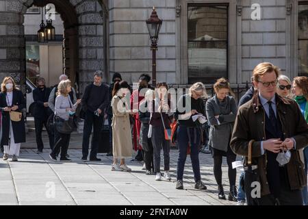 Queues of visitors outside the entrance to the Royal Academy of Arts, Burlington House, Piccadilly, London, England, United Kingdom Stock Photo