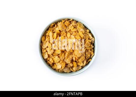 Corn flakes in a blue bowl isolated on white background Stock Photo