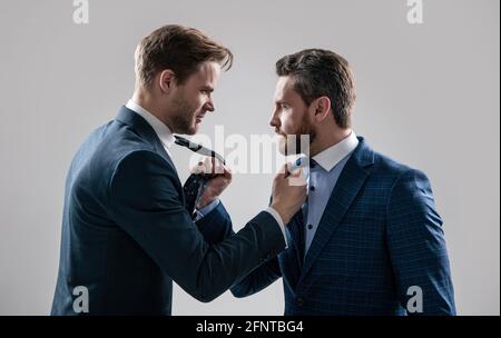 displeased colleague dispute. negotiations. businessmen talking and discussing conflict. Stock Photo