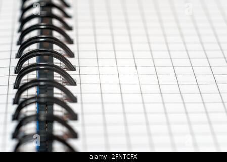 Checkered blank notebook closeup,macro shot.office pad,business concept. Stock Photo