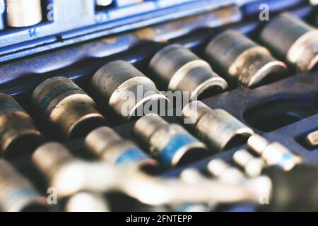 A set of automotive tools. Socket heads. Socket wrench. Repairs Stock Photo