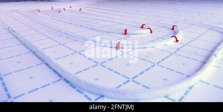 Underfloor heating system on a building site Stock Photo