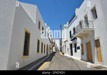 Landscape with scenic view of the main street with the typical whitewashed architecture in Chora the capital of Kythira island, Attica Greece. Stock Photo