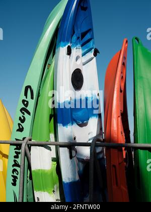 Surfboards and canoes available for hire near Lyme Regis Beach, Lyme Regis, Dorset, United Kingdom, 2019. Stock Photo