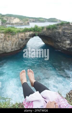 Sitting Relaxing view Broken Beach Bali Indonesia Stock Photo