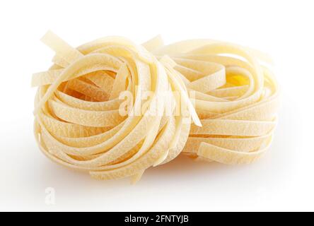 Uncooked tagliatelle pasta isolated on white background with clipping path Stock Photo