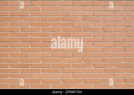 Brick wall with clean orange bricks. Background horizontal texture. Stock Photo