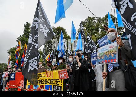 Tokyo, Japan. 19th May, 2021. Protesters of Southern Mongolian, Tibetan, Uyghur, pro-democracy of Myanmar and Japanese hold placards during the anti-China demonstration in front of the Diet Building Tokyo, Japan on Wednesday, May 19, 2021. Photo by Keizo Mori/UPI Credit: UPI/Alamy Live News Stock Photo