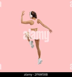 Modern design, contemporary art collage. Inspiration, idea, trendy magazine style. Sport. Professional female athlete on pink background. Stock Photo