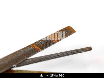 Close up of old and rusty rasp tool equipment on a white background Stock Photo
