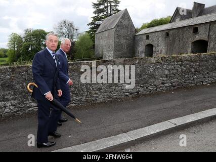 The Prince of Wales with Lord Caledon (left) during his visit to Caledon where he viewed the sites of upcoming development projects around the village. Picture date: Wednesday May 19, 2021. Stock Photo