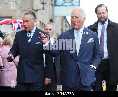 The Prince of Wales with Lord Caledon (left) during his visit to Caledon where he viewed the sites of upcoming development projects around the village. Picture date: Wednesday May 19, 2021. Stock Photo