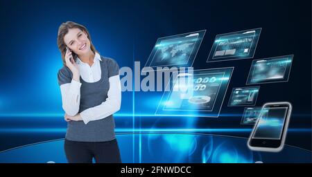 Composition of smiling businesswoman using smartphone over digital screens with data processing Stock Photo