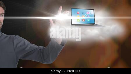 Composition of businessman touching laptop with digital icons Stock Photo