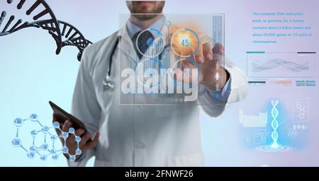 Composition of male doctor touching screen with medical data processing Stock Photo