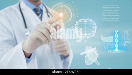 Composition of male doctor touching screen with human brain and medical data processing Stock Photo