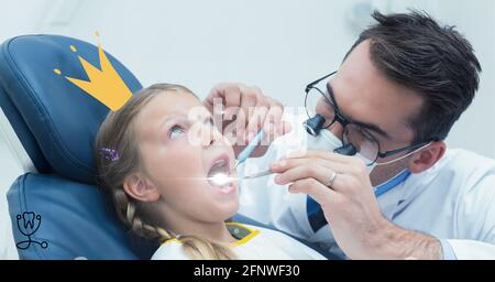 Composition of male dentist and girl patient with yellow crown Stock Photo