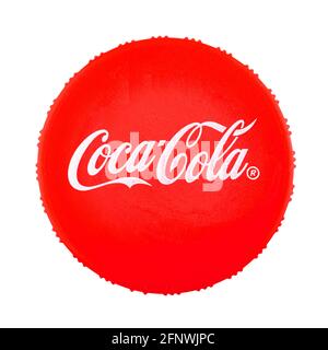 Kharkov, Ukraine - May 11, 2021: Close up photo of Coca-Cola cap with logo isolated on white background, top view Stock Photo