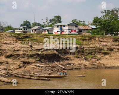 Amazon River, Peru - May 12, 2016: Small village on the bank of the Amazon River Stock Photo