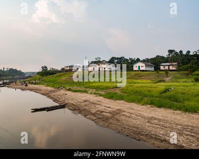 Amazon River, Peru - May 12, 2016: Small village on the bank of the Amazon River Stock Photo