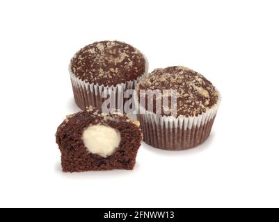 Two chocolate muffins and a half on white Stock Photo
