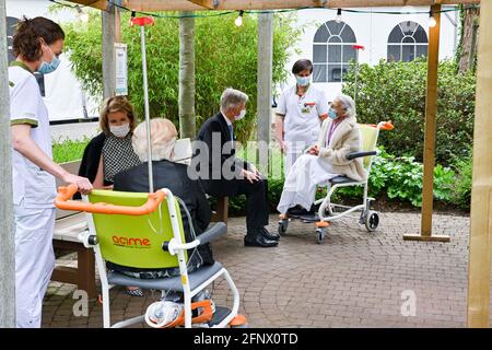 Queen Mathilde of Belgium and King Philippe - Filip of Belgium talk to patients at the 'Babbelbank', during a royal visit to the Salvator Campus of th Stock Photo