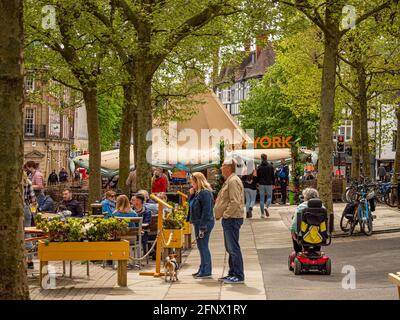 Parliament Street outdoor seating area with tipi in the distance.York. UK Stock Photo