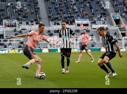 Newcastle, England, 19th May 2021. Chris Basham of Sheffield Utd takes on Matt Ritchie of Newcastle United during the Premier League match at St. James's Park, Newcastle. Picture credit should read: Darren Staples / Sportimage Credit: Sportimage/Alamy Live News Stock Photo