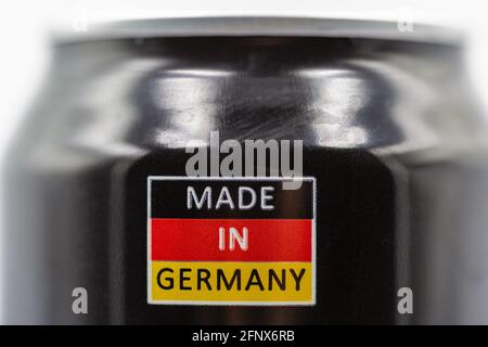 the inscription Made in Germany on the background of the colors of the German flag closeup on beer can Stock Photo