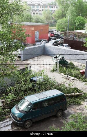 Broken trees after storm in the urban backyard, view top-down from window,  St.Petersburg, Russia Stock Photo