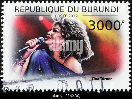Tina Turner in concert on african postage stamp Stock Photo